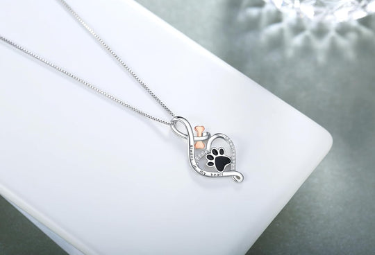 Collier avec pendentif cœur, empreinte de patte et symbole infini