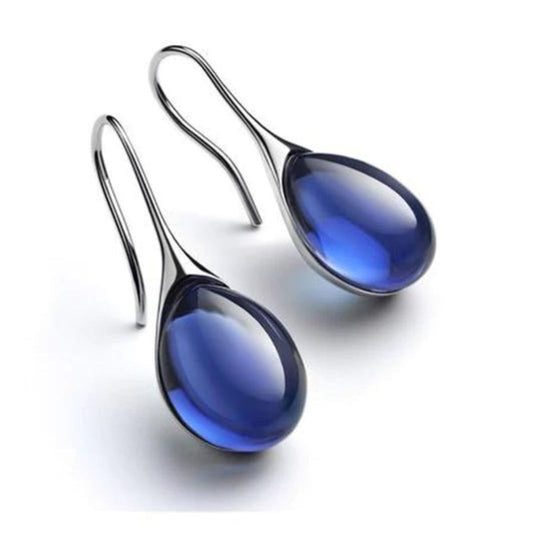 Boucles d'oreilles pendantes avec cristaux, tons or et argent