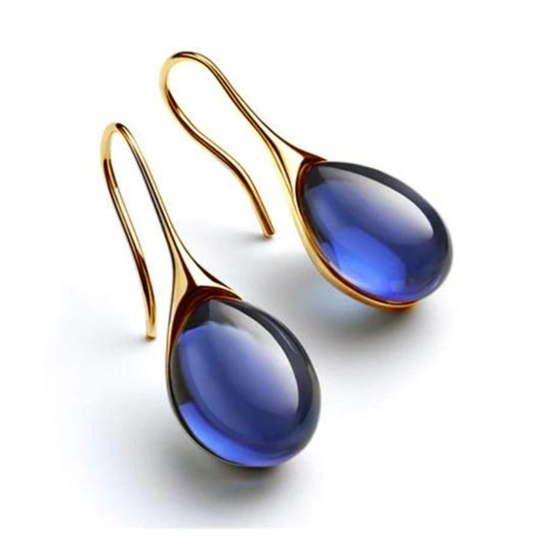 Boucles d'oreilles pendantes avec cristaux, tons or et argent