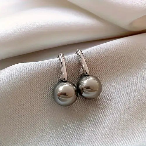 Celeste – Boucles d'oreilles pendantes avec perle