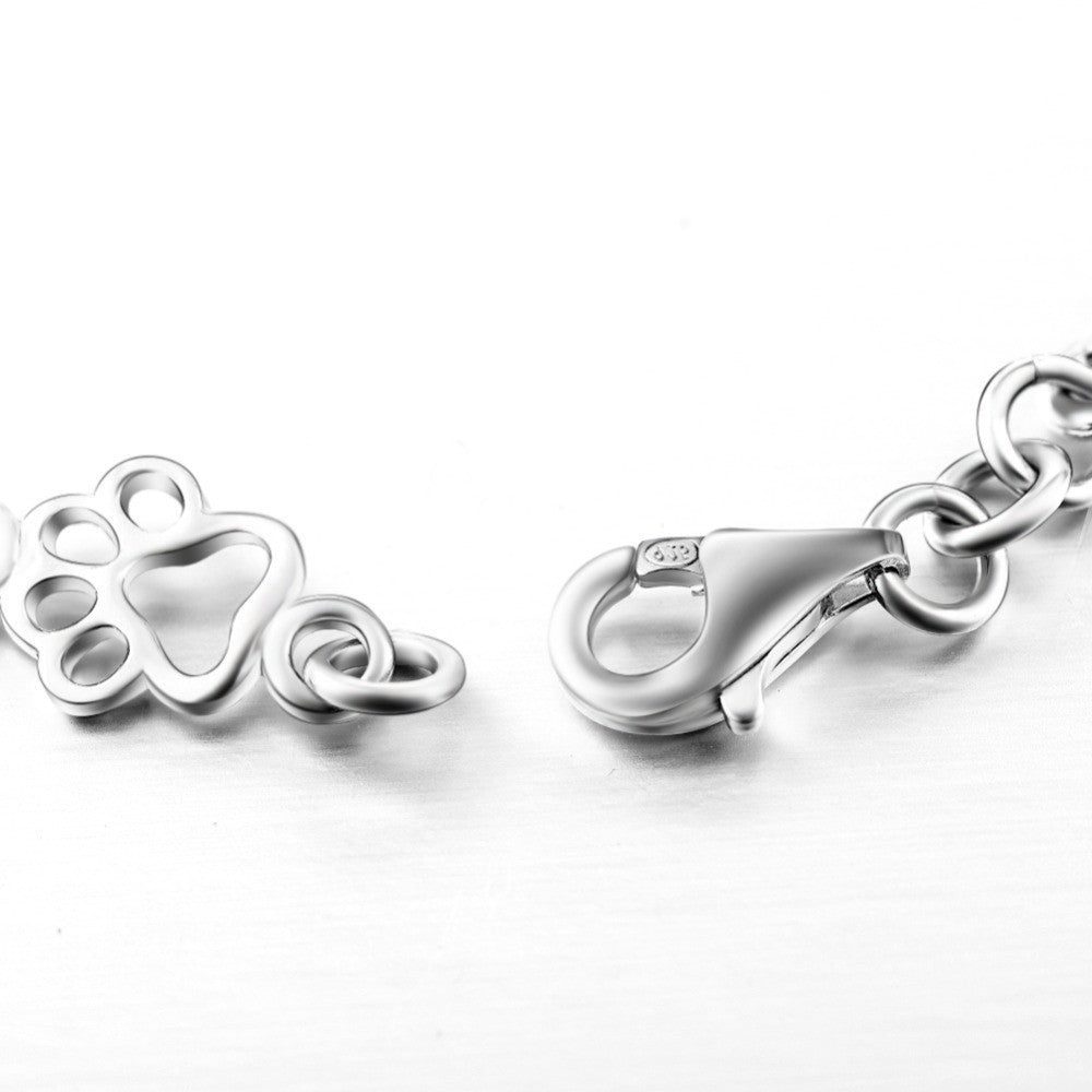 Bracelet en argent avec empreinte de patte et motif os