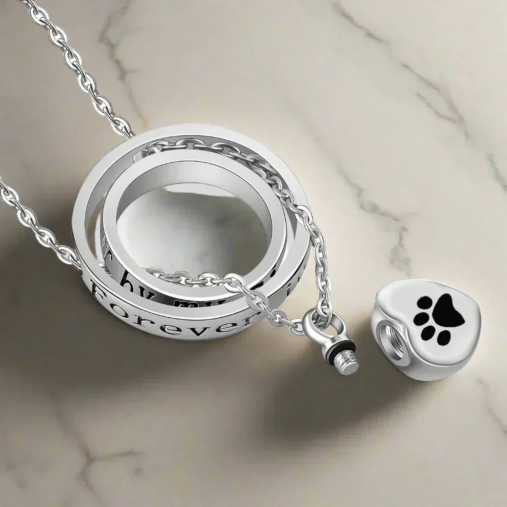 Collier souvenir empreinte de patte en acier inoxydable