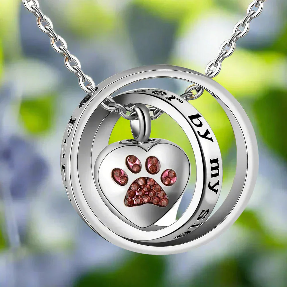 Collier souvenir empreinte de patte en acier inoxydable