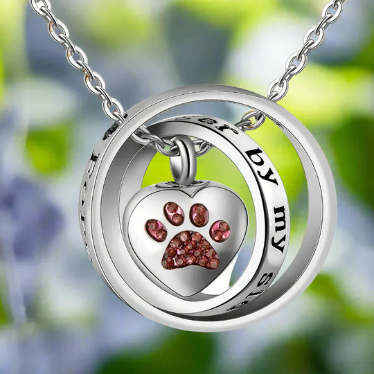 Collier souvenir empreinte de patte en acier inoxydable