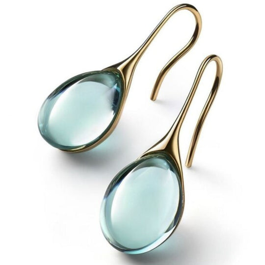 Boucles d'oreilles pendantes avec cristaux, tons or et argent