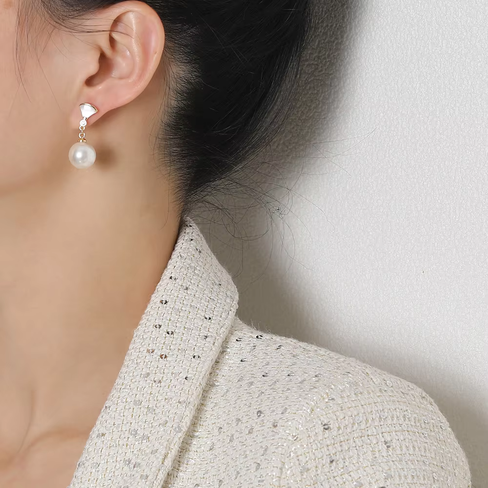 Boucles d'oreilles perlées rétro avec pendentifs argentés