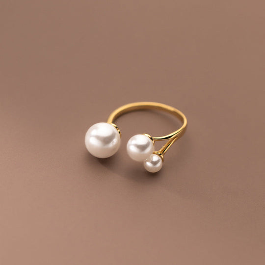Bague ajustable à trois perles d'eau douce