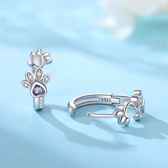 Boucles d'oreilles en argent avec empreinte de patte et zircone cœur