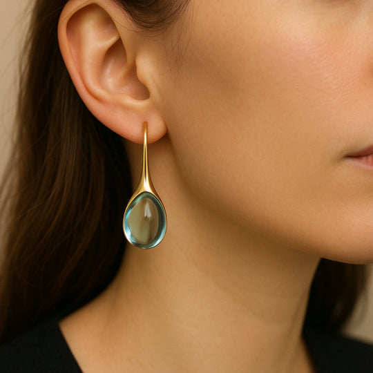 Boucles d'oreilles pendantes avec cristaux, tons or et argent