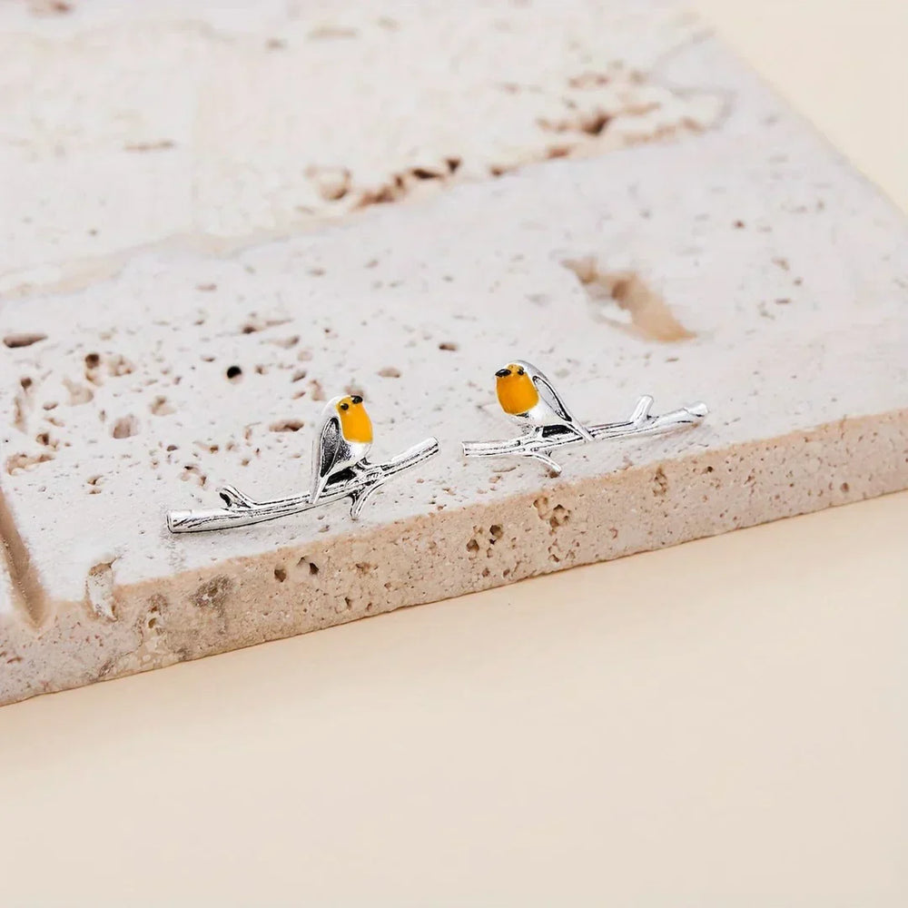 Boucles d'oreilles oiseaux style bande dessinée