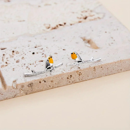 Boucles d'oreilles oiseaux style bande dessinée