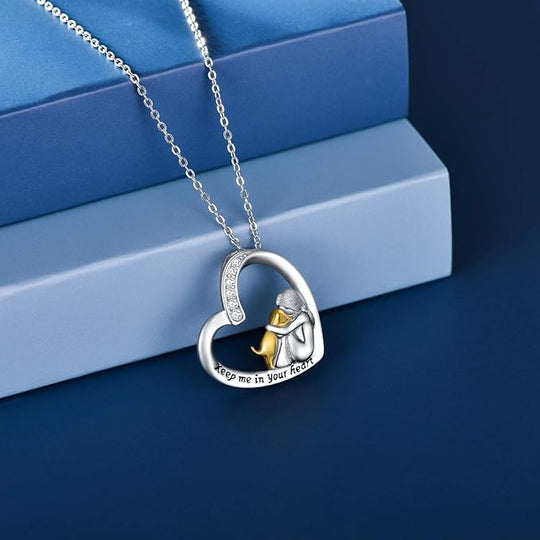 Collier en argent avec pendentif cœur, fille et chien
