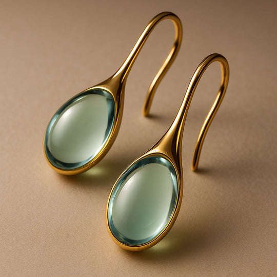 Boucles d'oreilles pendantes avec cristaux, tons or et argent