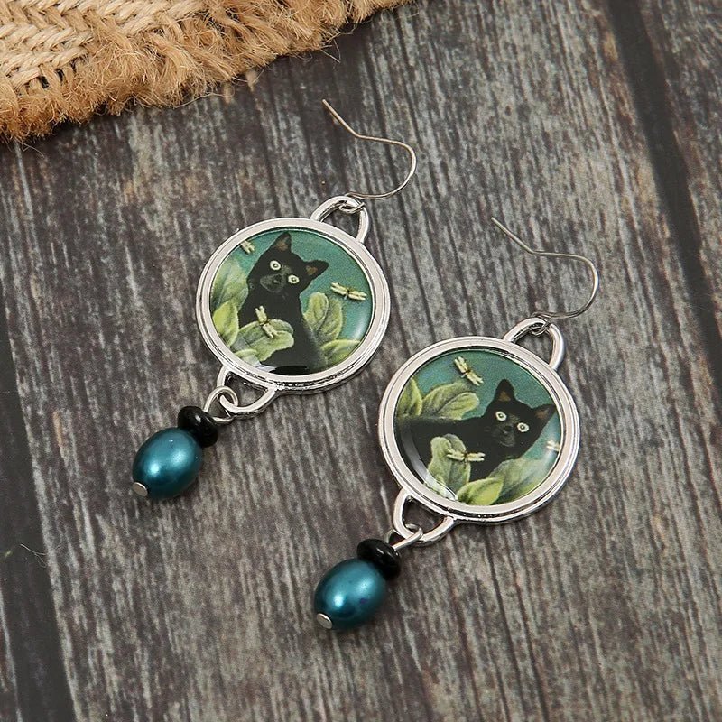 Boucles d'oreilles style vintage motif chat noir tropical